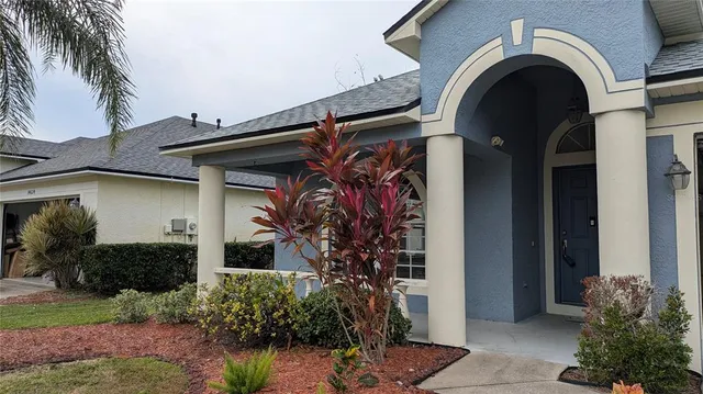 a view of a house with a small porch