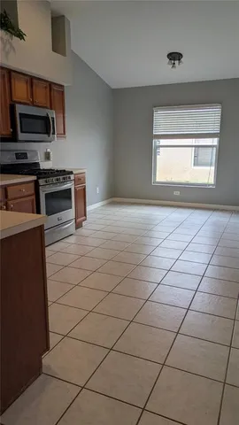 a view of kitchen and microwave