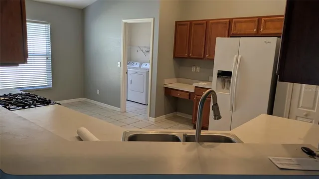 a bathroom with a sink and a large mirror