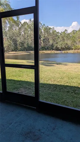 a view of a large window with an outdoor space