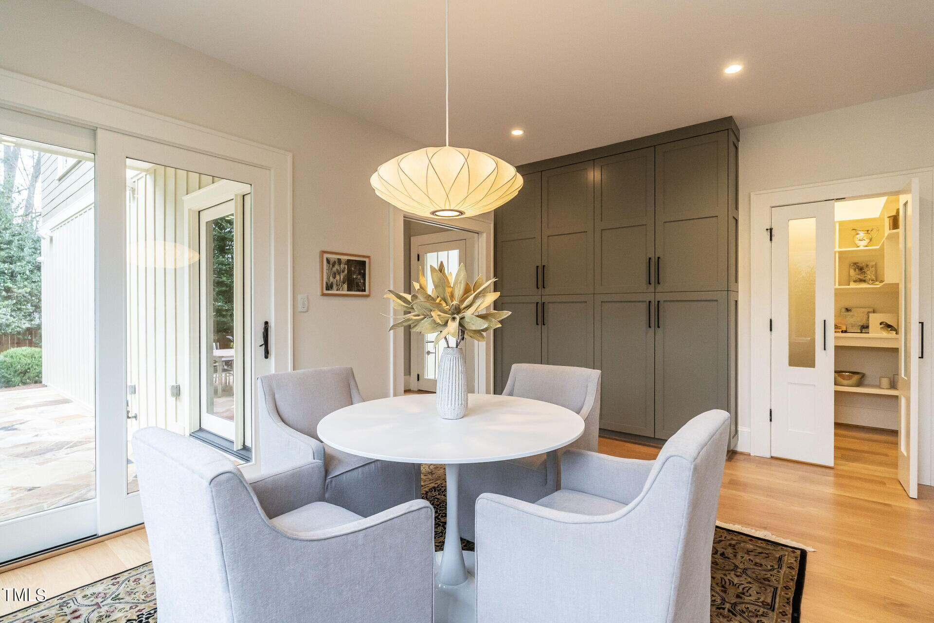 1610 St Marys Street Raleigh, NC 27608 - Photo 19 of 41 a dining room with furniture and wooden floor