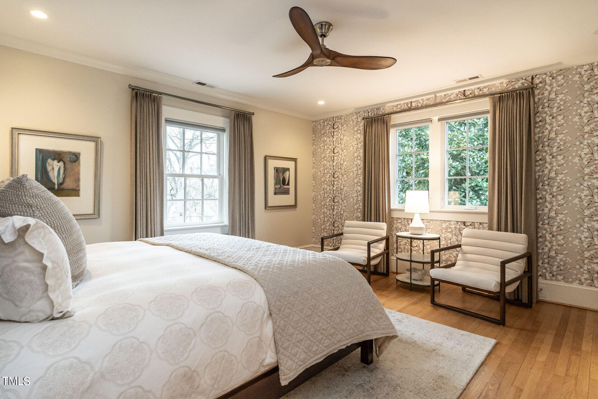 1610 St Marys Street Raleigh, NC 27608 - Photo 21 of 41 a bedroom with a bed and a large window