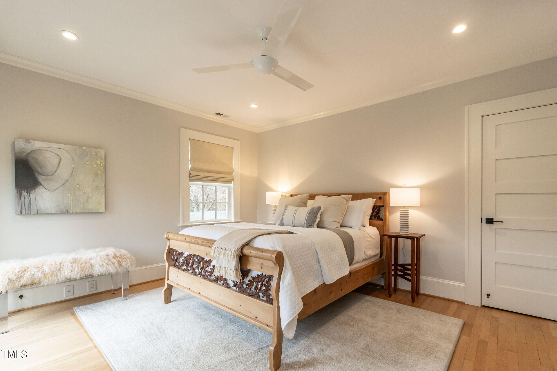 1610 St Marys Street Raleigh, NC 27608 - Photo 24 of 41 a bed room with a bed and a couch