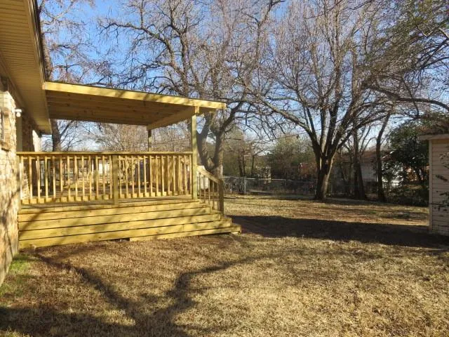 a view of a swimming pool with an outdoor space