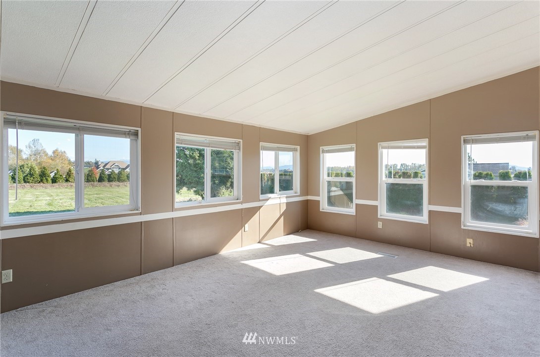 5998 Elder Road Ferndale, WA 98248 - Photo 9 of 23 a view of an empty room with a window