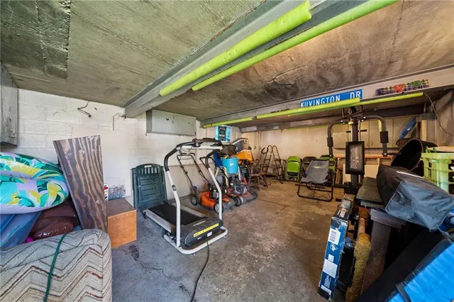 a aerial view of a house with table and chairs