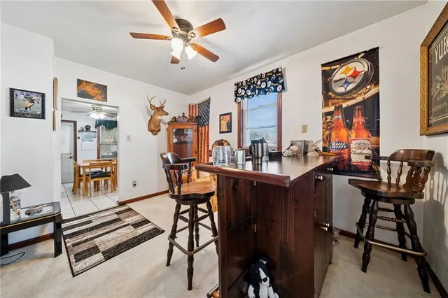 a view of a workspace with furniture and a livingroom