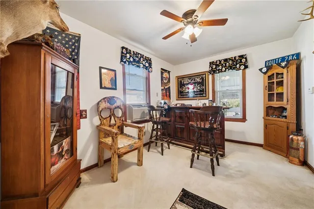 a view of a livingroom with furniture