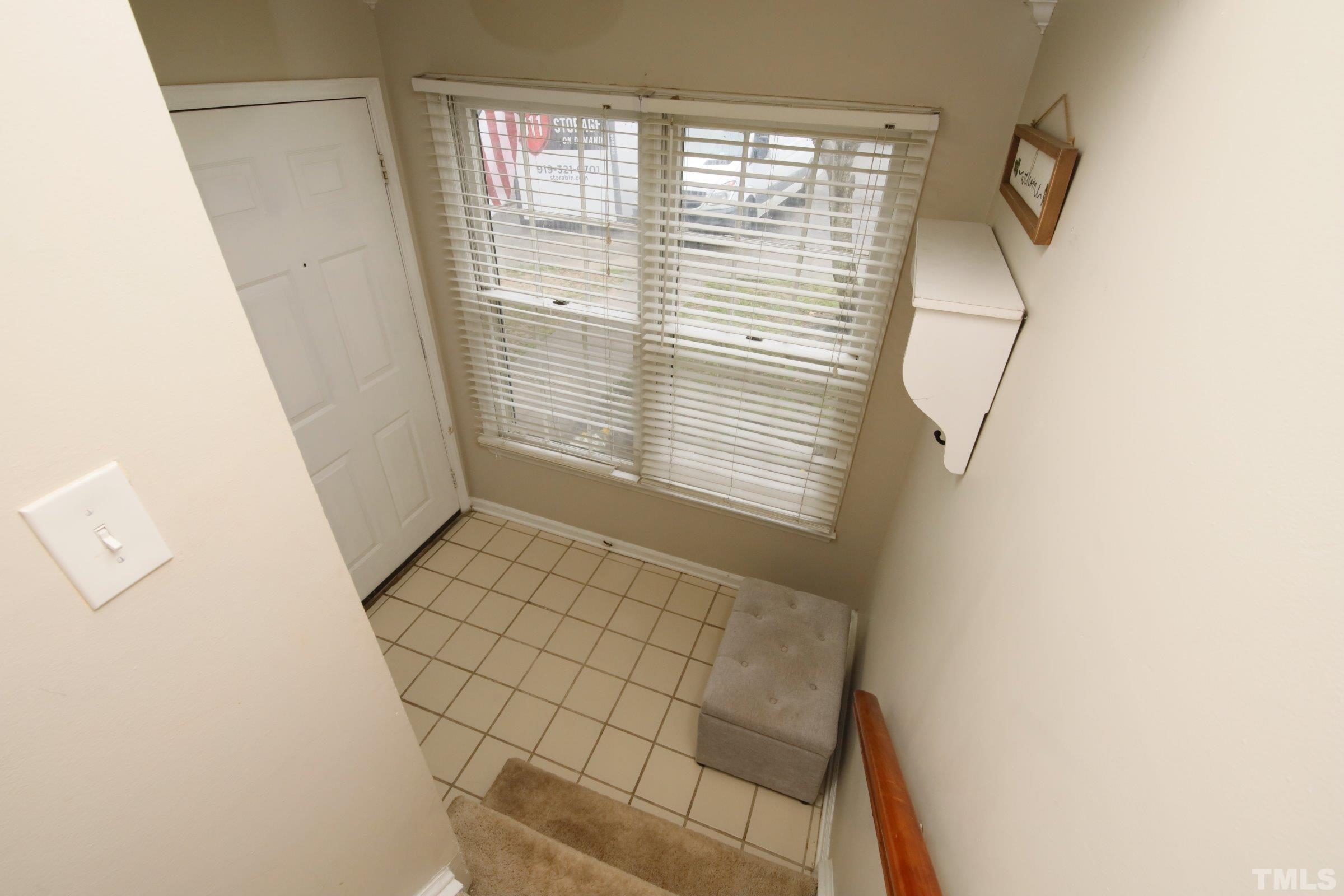116 Long Shadow Place Durham, NC 27713 - Photo 23 of 38 a view of an empty room with a window