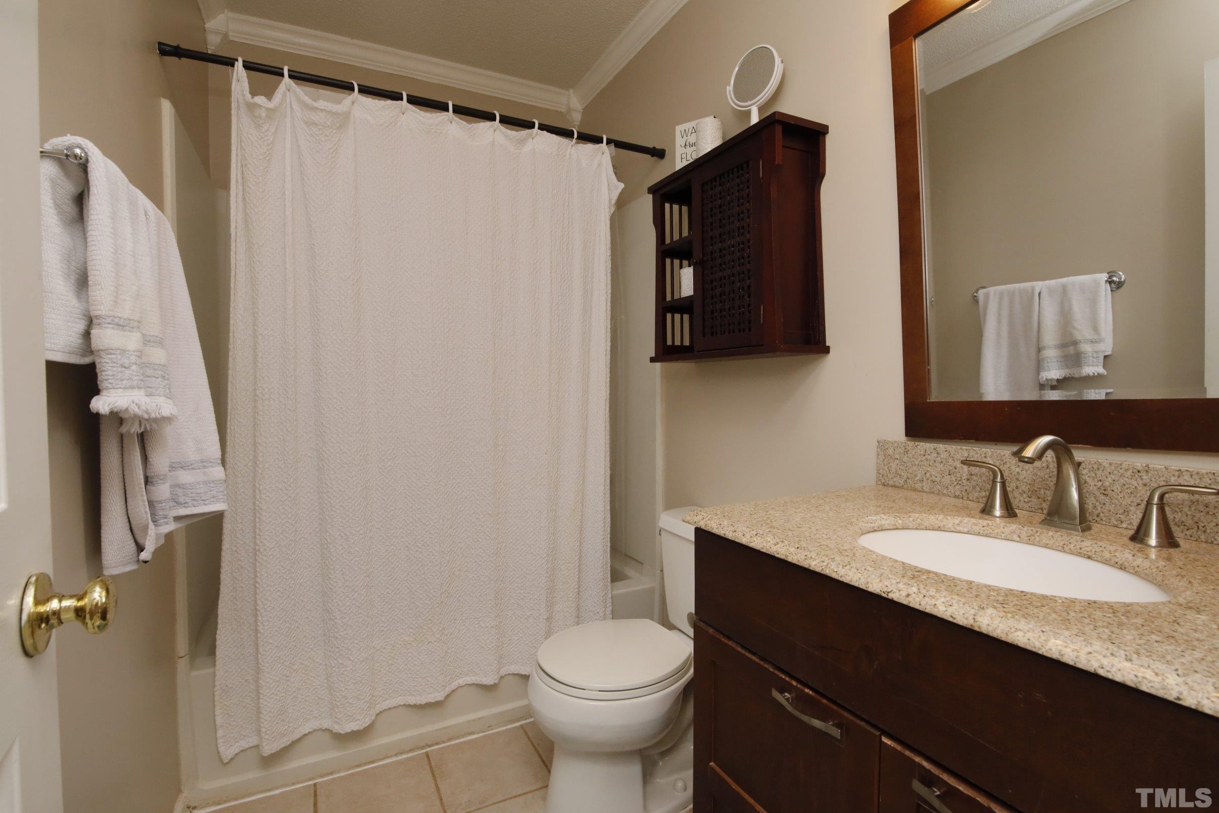 116 Long Shadow Place Durham, NC 27713 - Photo 30 of 38 a bathroom with a granite countertop sink toilet and shower