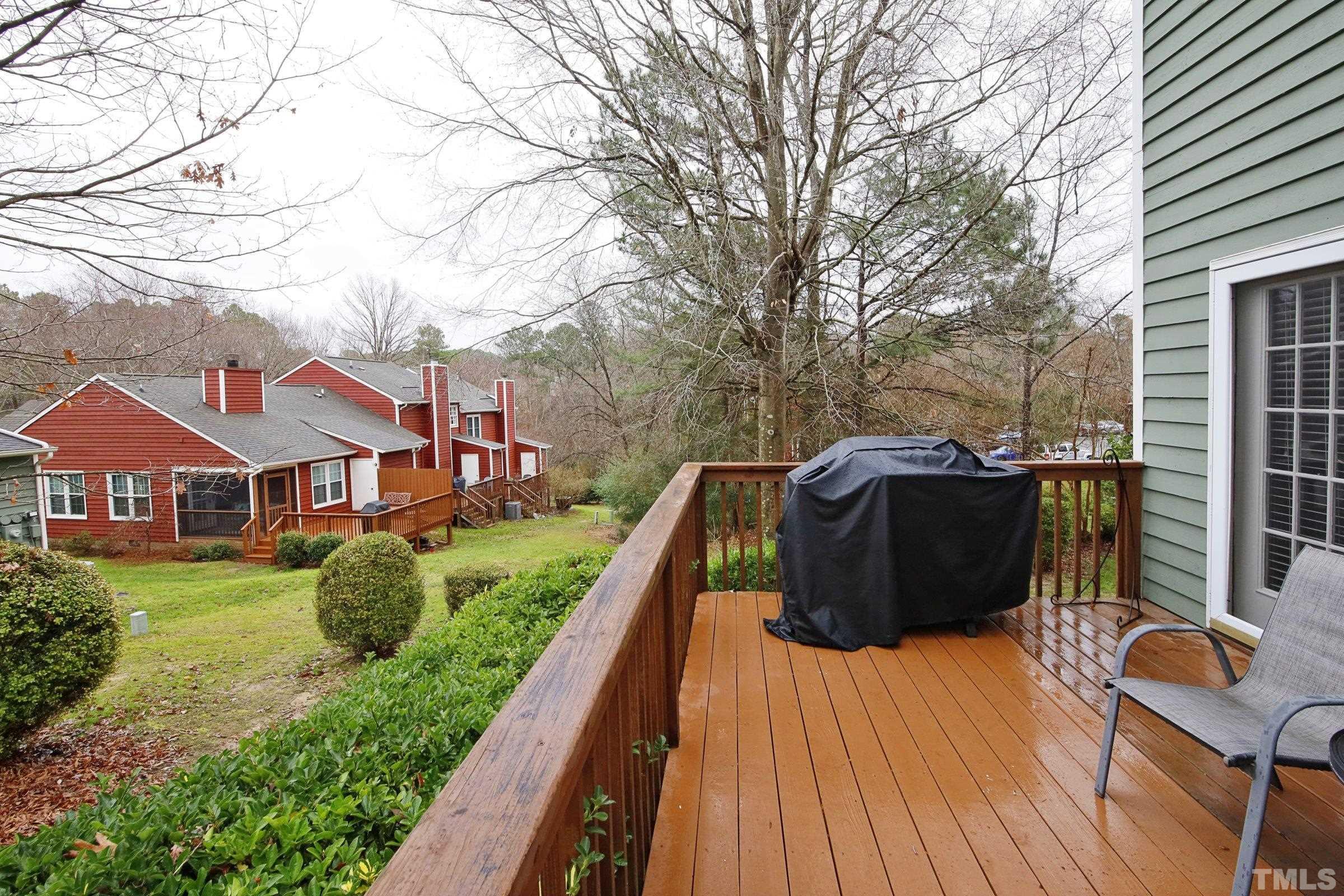 116 Long Shadow Place Durham, NC 27713 - Photo 31 of 38 a view of a house with backyard and sitting area