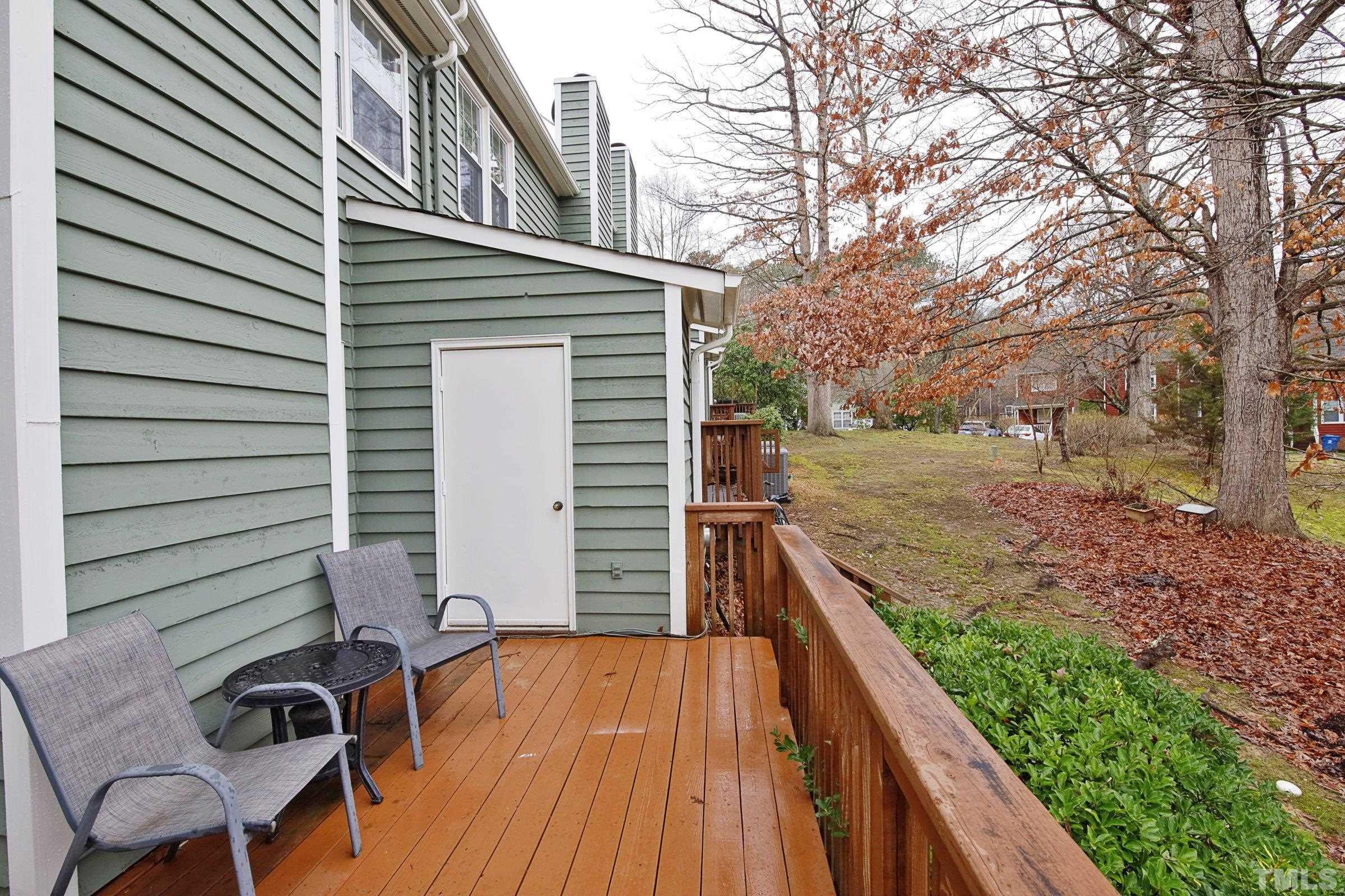 116 Long Shadow Place Durham, NC 27713 - Photo 32 of 38 a view of a backyard with sitting area