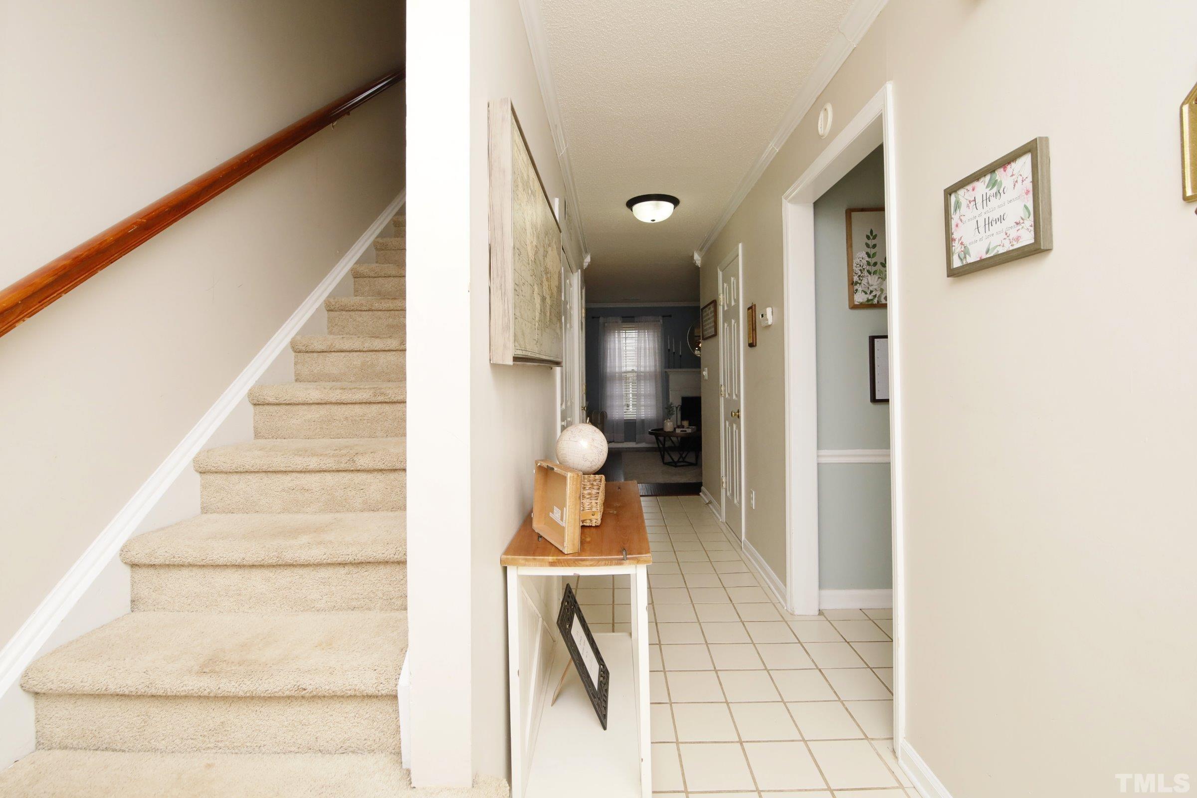 116 Long Shadow Place Durham, NC 27713 - Photo 5 of 38 a view of entryway and hall with wooden floor