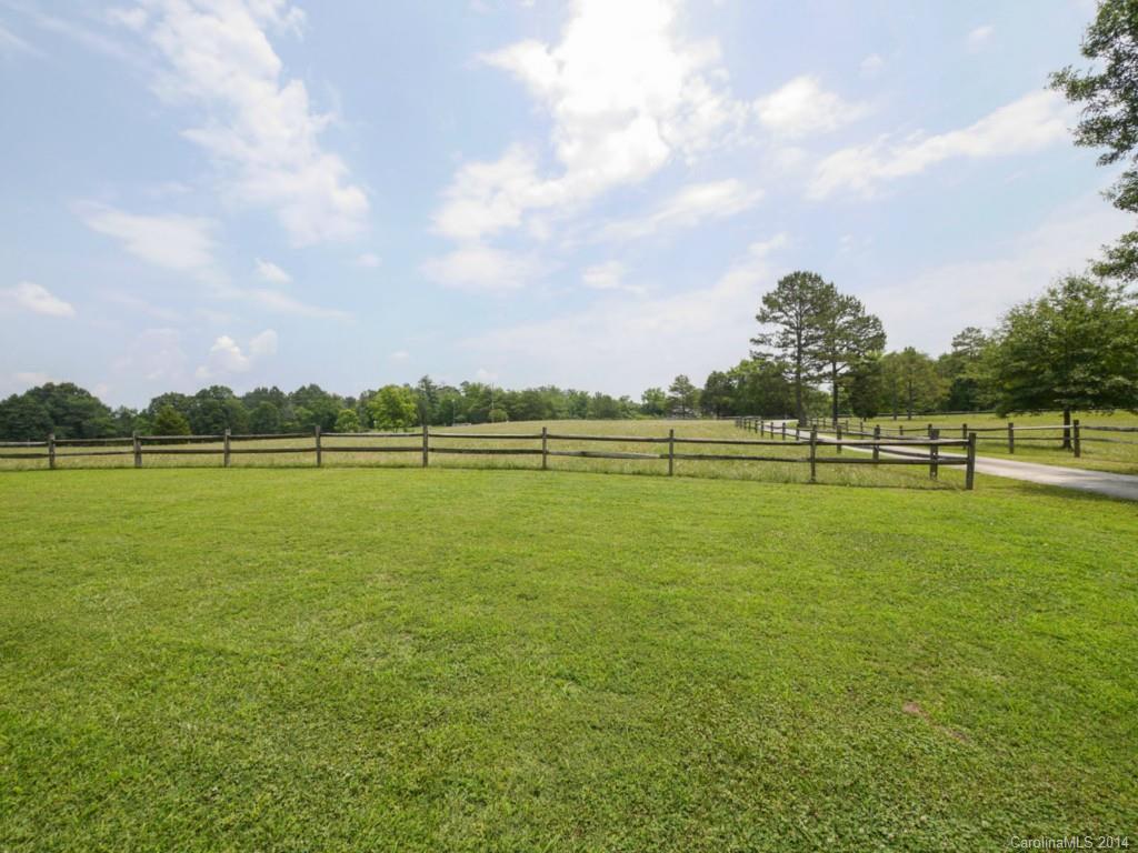 761 State Rd S-46-422 Clover, SC 29710 - Photo 22 of 22 a view of a golf course with a lake