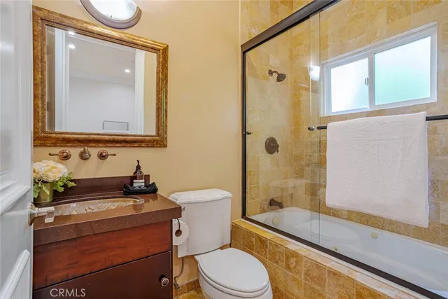 a bedroom with a bed and a closet