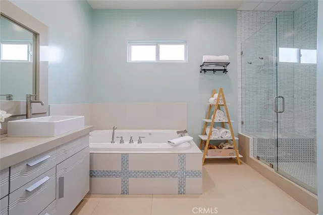 a bathroom with a sink and a shower