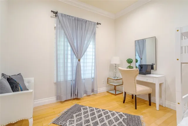 a bedroom with a bed and a table in it