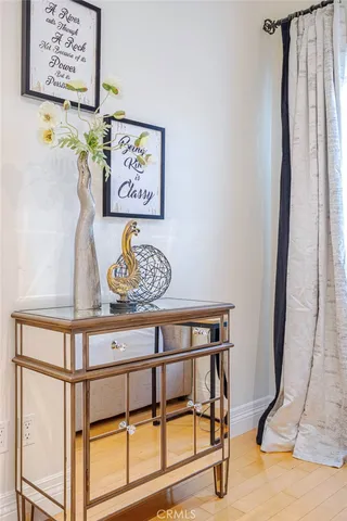 a bathroom with a sink a vanity and mirror