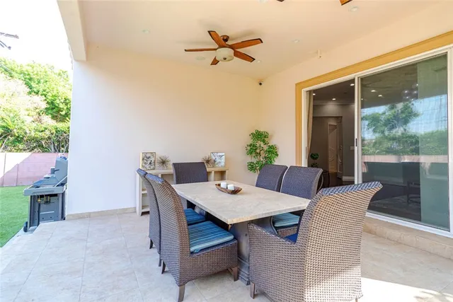 a living room with furniture a rug and a fireplace