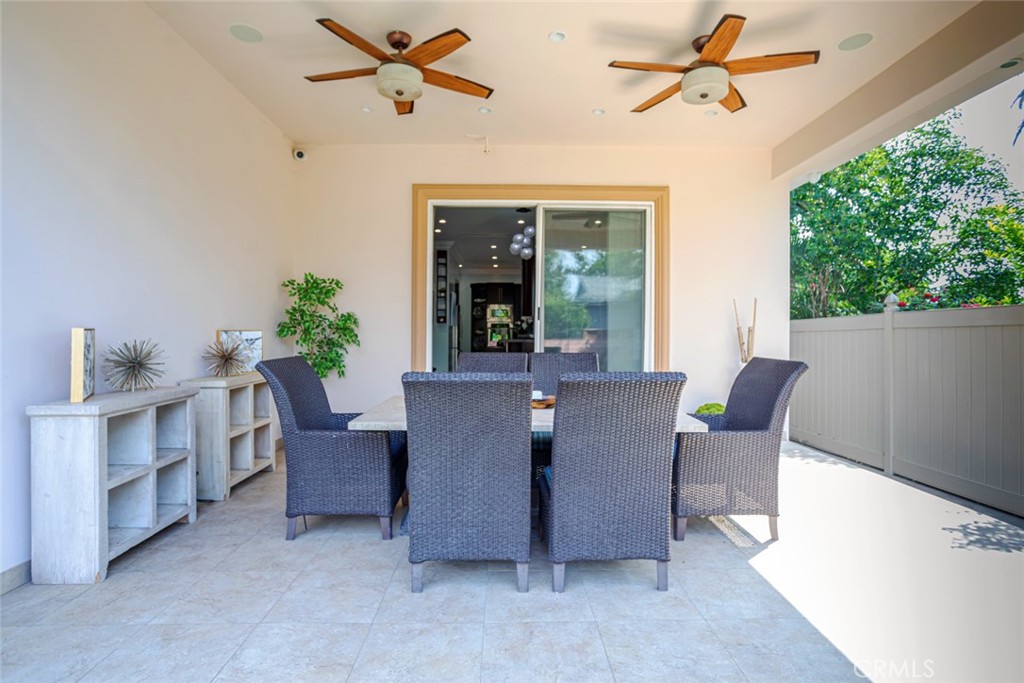 12945 Calvert Street Van Nuys, CA 91401 - Photo 46 of 57 a view of a dining room with furniture window and outside view