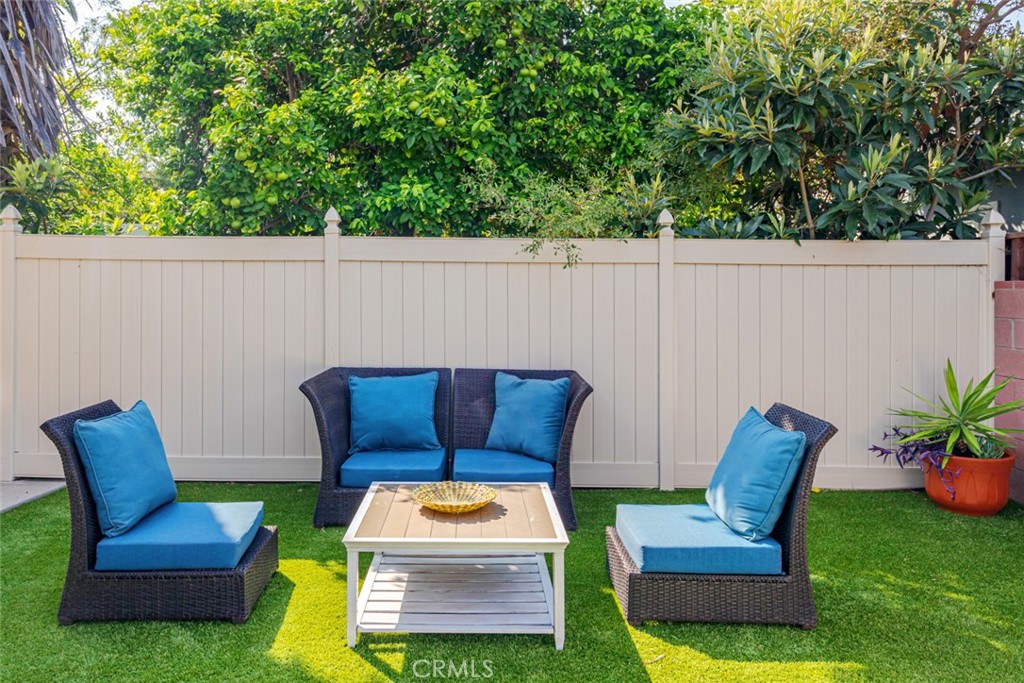 12945 Calvert Street Van Nuys, CA 91401 - Photo 50 of 57 a outdoor living space with furniture and garden