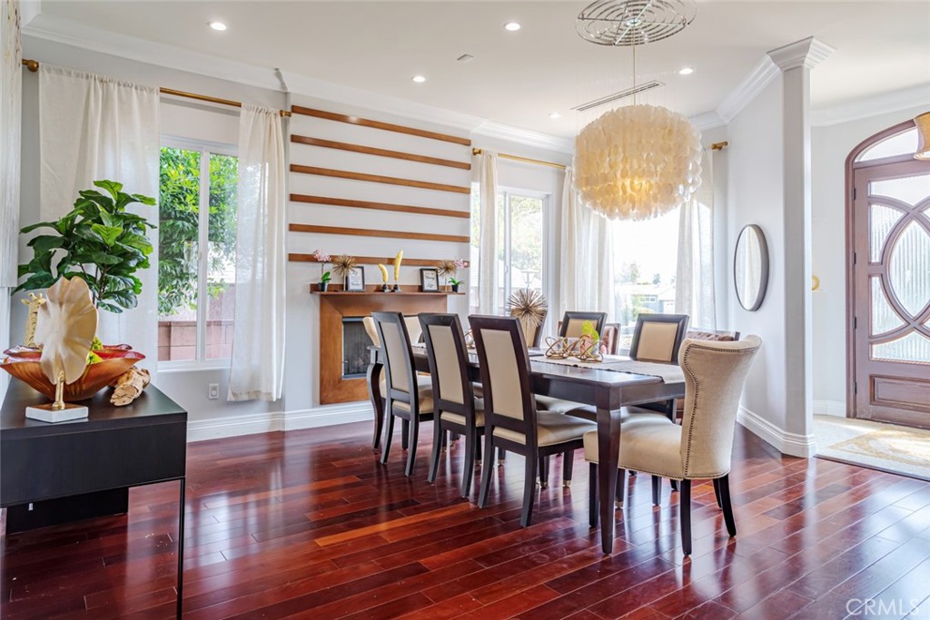 12945 Calvert Street Van Nuys, CA 91401 - Photo 5 of 57 a view of a a dining room with furniture window and wooden floor
