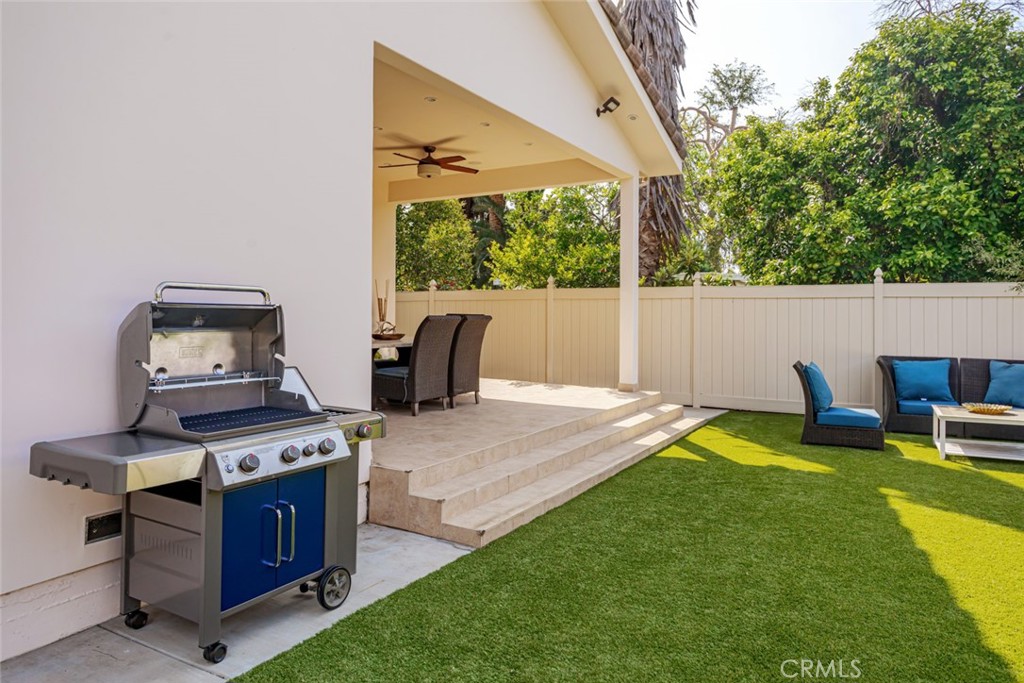 12945 Calvert Street Van Nuys, CA 91401 - Photo 57 of 57 a view of a backyard with furniture and garden