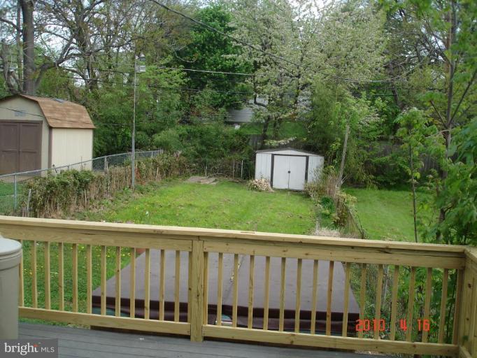 420 Walcott Road Baltimore, MD 21206 - Photo 3 of 11 a view of a wooden deck