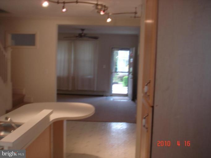420 Walcott Road Baltimore, MD 21206 - Photo 7 of 11 a bathroom with a sink and a vanity