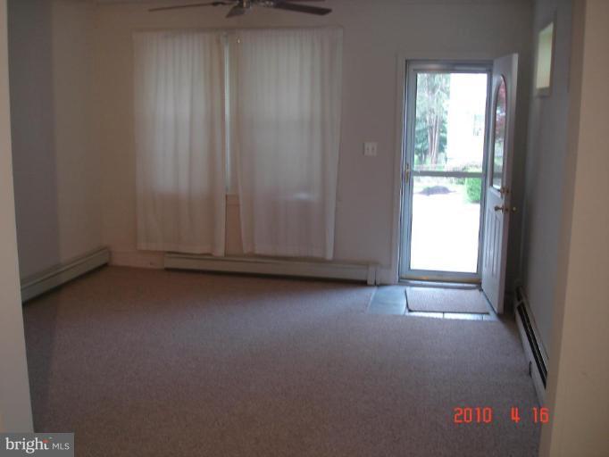 420 Walcott Road Baltimore, MD 21206 - Photo 8 of 11 a view of empty room with window