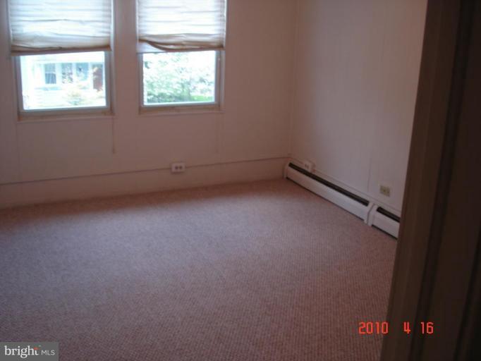 420 Walcott Road Baltimore, MD 21206 - Photo 9 of 11 an empty room with a window