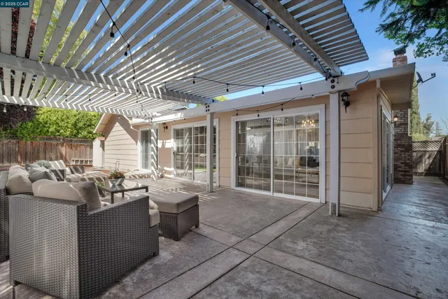 a view of a backyard with large trees