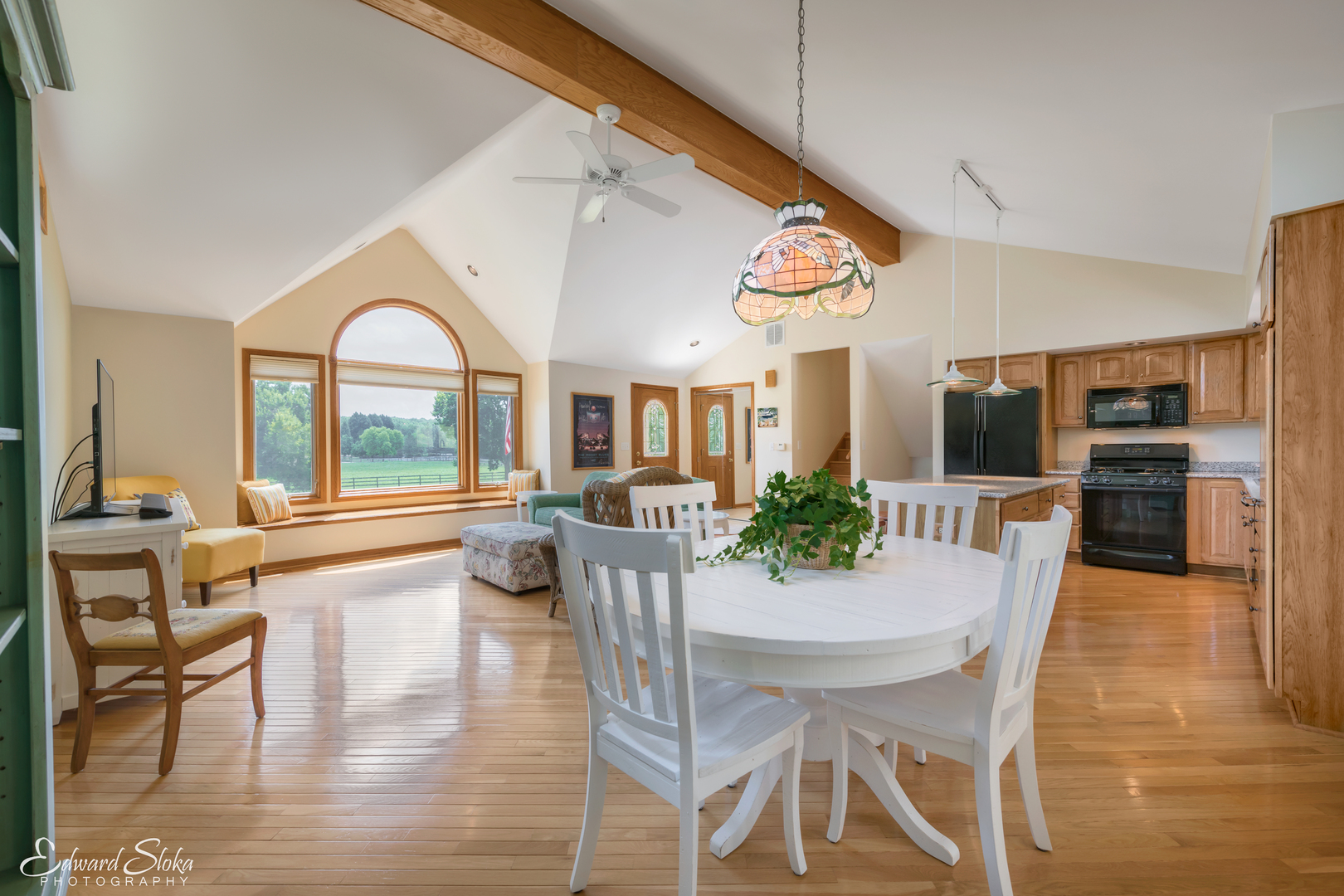 288 Fox Harbor Road Trout Valley, IL 60013 - Photo 12 of 34 a view of a dining room with furniture window and wooden floor
