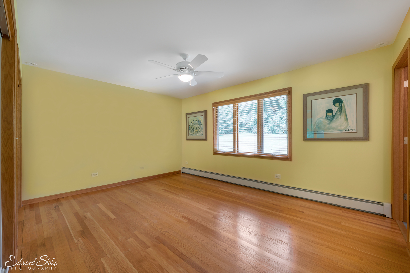288 Fox Harbor Road Trout Valley, IL 60013 - Photo 16 of 34 a view of an empty room with a window and wooden floor
