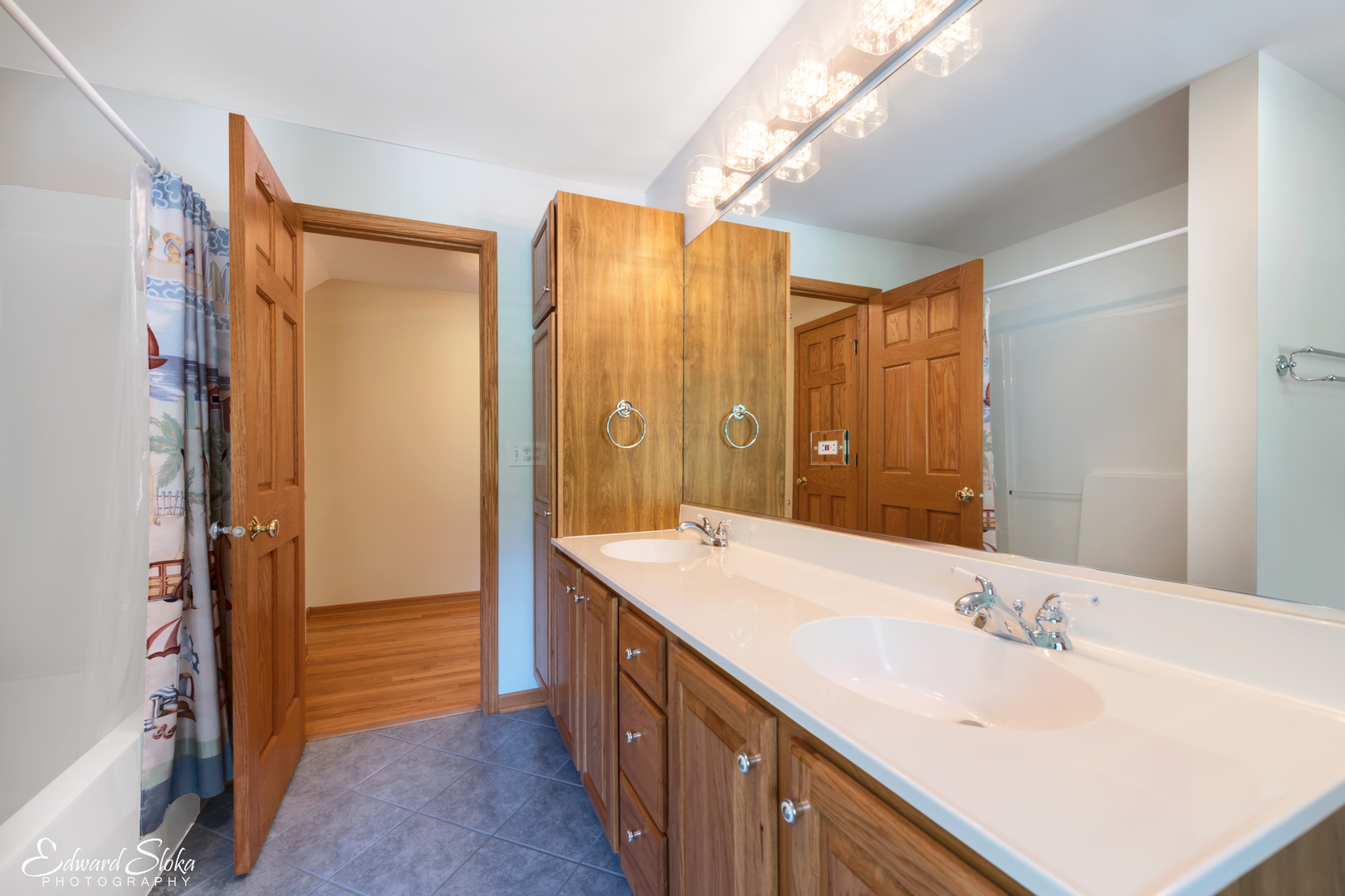 288 Fox Harbor Road Trout Valley, IL 60013 - Photo 18 of 34 a bathroom with a double vanity sink mirror and shower