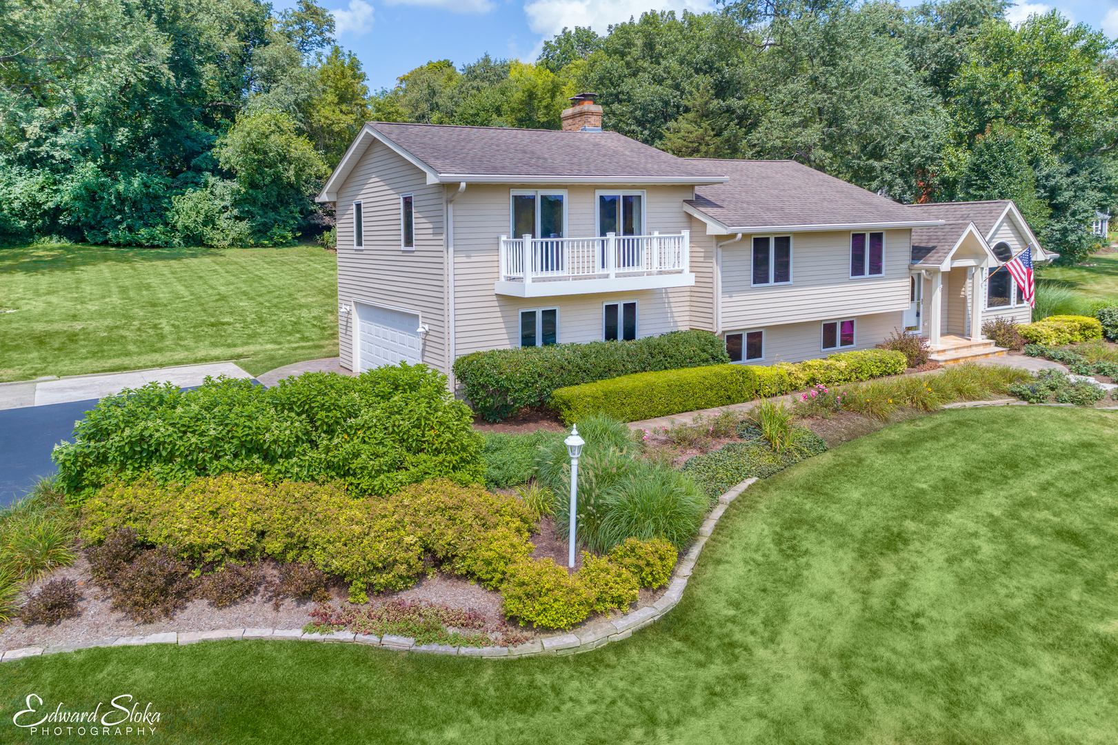 288 Fox Harbor Road Trout Valley, IL 60013 - Photo 3 of 34 a aerial view of a house with a yard table and chairs