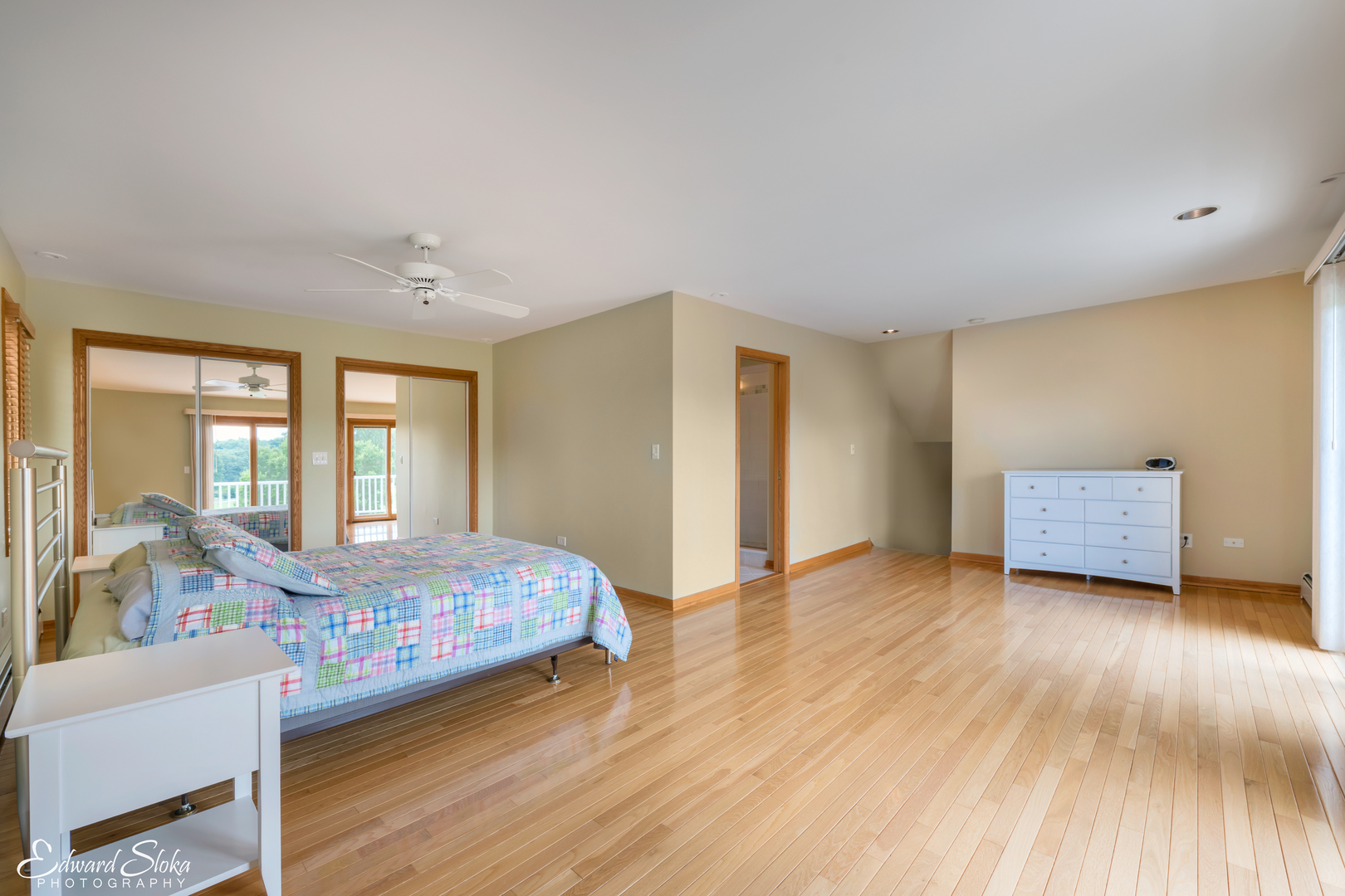 288 Fox Harbor Road Trout Valley, IL 60013 - Photo 25 of 34 a bedroom with a bed and a large window