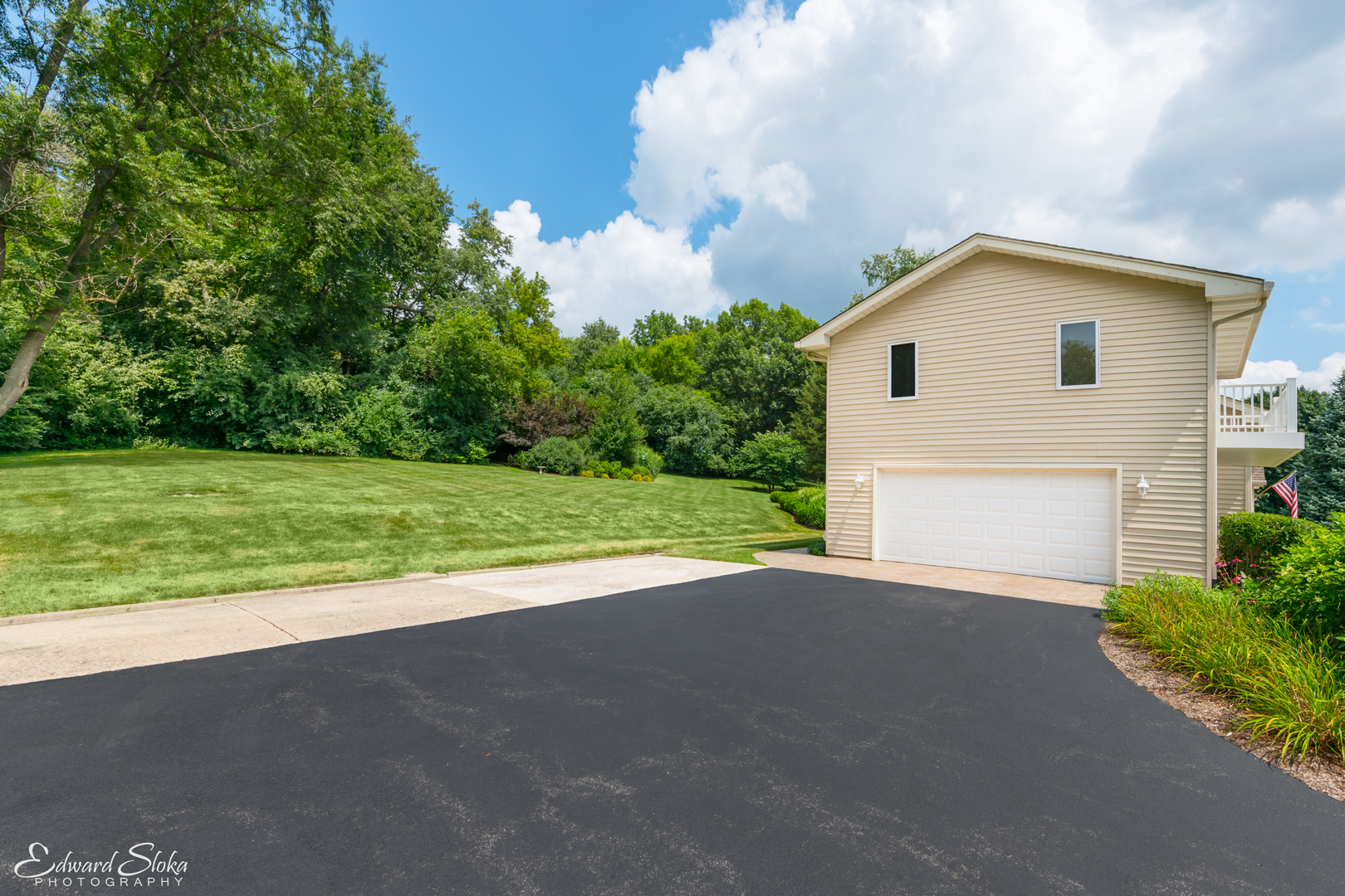 288 Fox Harbor Road Trout Valley, IL 60013 - Photo 28 of 34 a view of a house with a yard and garage
