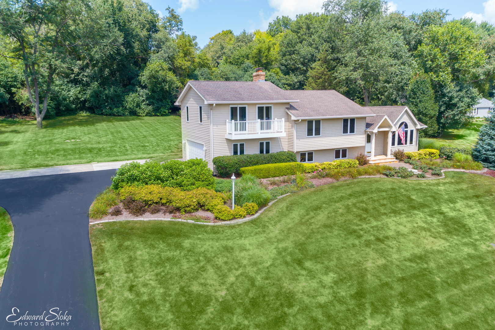 288 Fox Harbor Road Trout Valley, IL 60013 - Photo 29 of 34 a aerial view of a house with a yard table and chairs