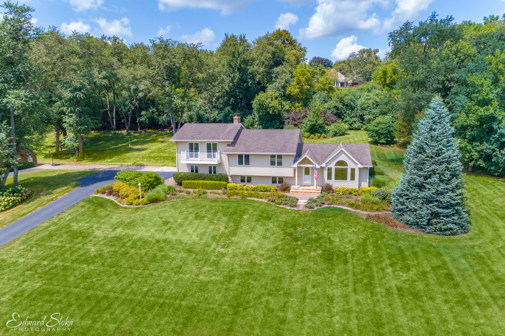 288 Fox Harbor Road Trout Valley, IL 60013 - Photo 34 of 34 an aerial view of a house with swimming pool and garden