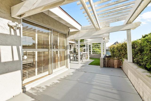 a outdoor living space with furniture and garden view