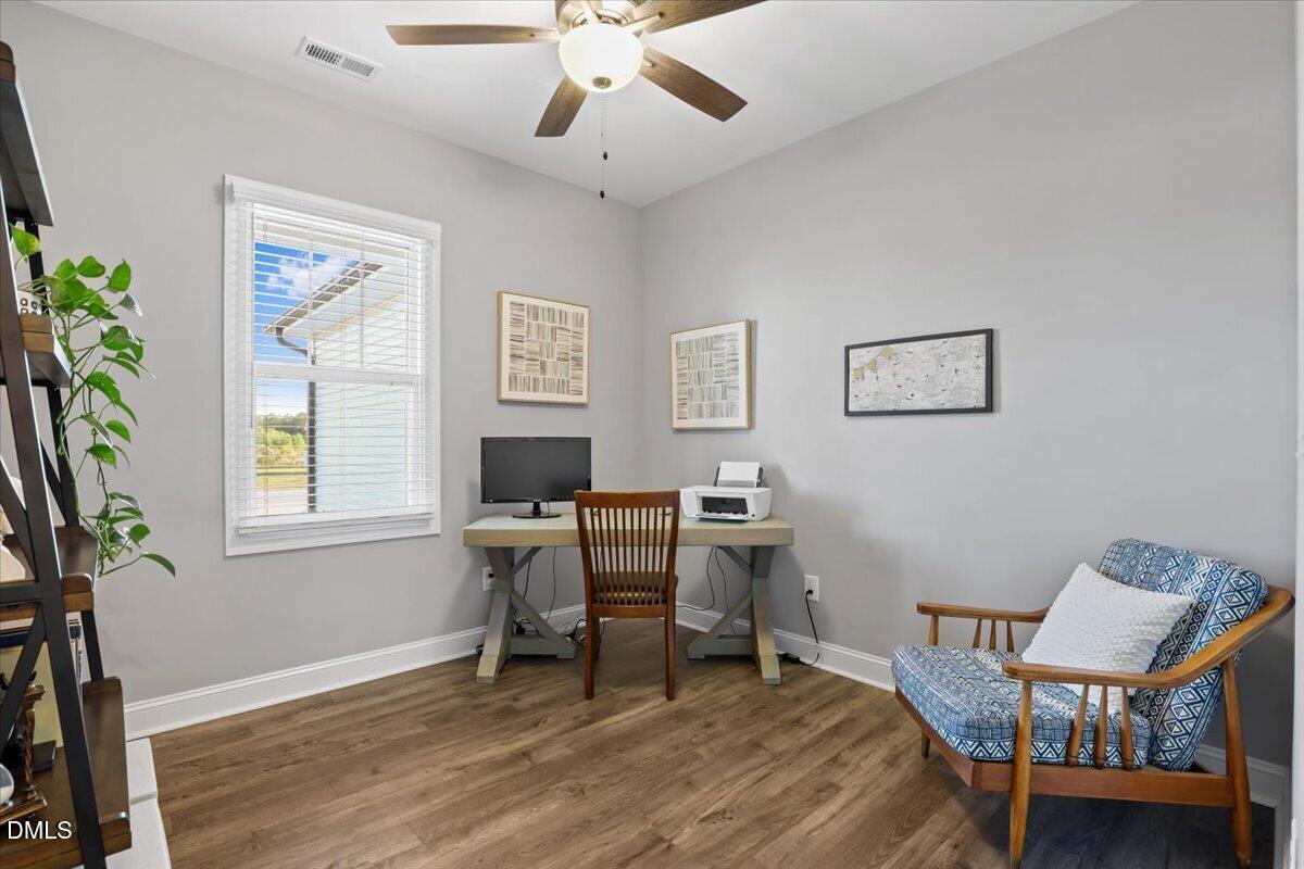 88 Heath Road Lillington, NC 27546 - Photo 18 of 54 a workspace with wooden floor and a workspace