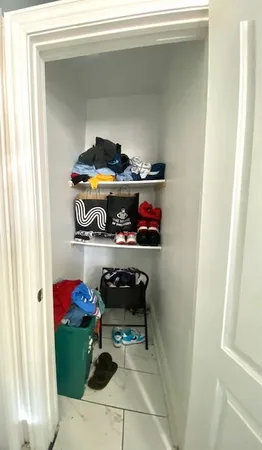 a kitchen with stainless steel appliances a refrigerator and a stove