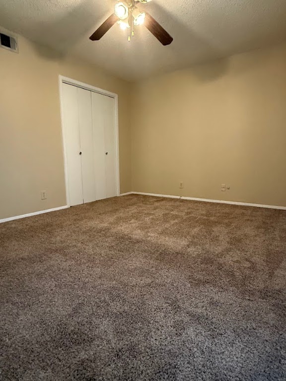 202 East 45th Street, Unit 306 Austin, TX 78751 - Photo 11 of 11 an empty room with a ceiling fan and window