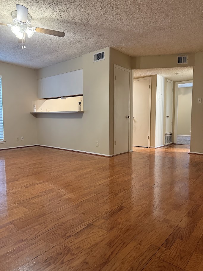 202 East 45th Street, Unit 306 Austin, TX 78751 - Photo 2 of 11 a view of an empty room with wooden floor