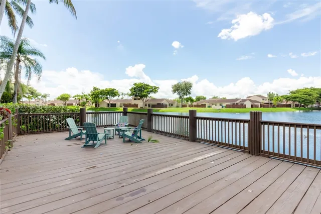 a view of a car parked in front of a brick house