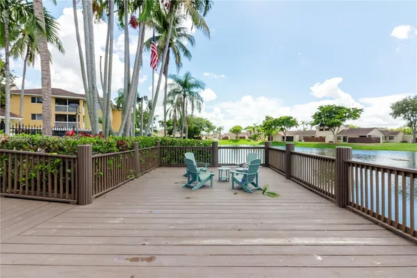 a view of a park with palm trees