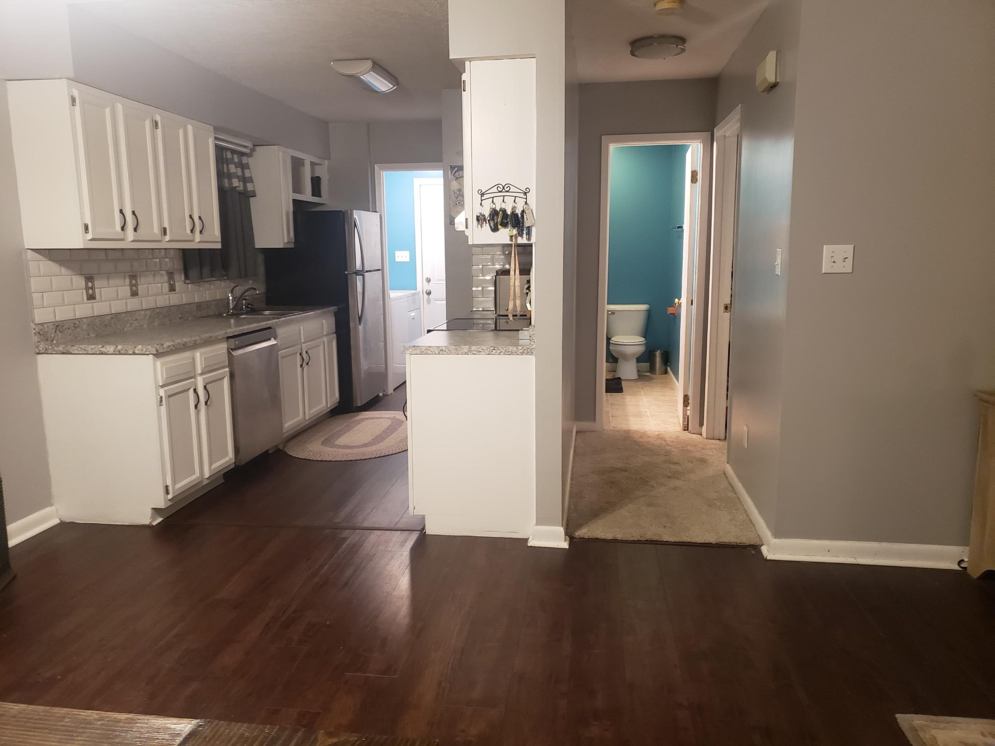 175 Judson Road Heiskell, TN 37754 - Photo 6 of 32 a kitchen with granite countertop a refrigerator stove top oven and sink