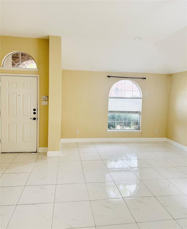 1111 Mount Olive Lane Forney, TX 75126 - Photo 4 of 15 a view of a livingroom with wooden floor and a sink