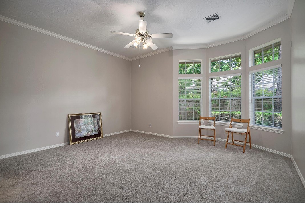 34 Reflection Point The Woodlands, TX 77381 - Photo 22 of 42 Primary Bedroom with a bowed out window